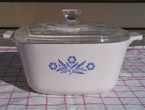 It comes with unique but colorful orange, yellow and pink poppy, and daisy designs. . Corning ware cornflower blue
